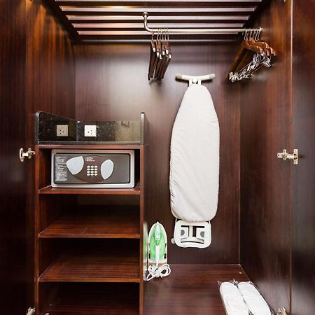 Radisson Blu Coimbatore Exterior photo A hotel room wardrobe with a safe