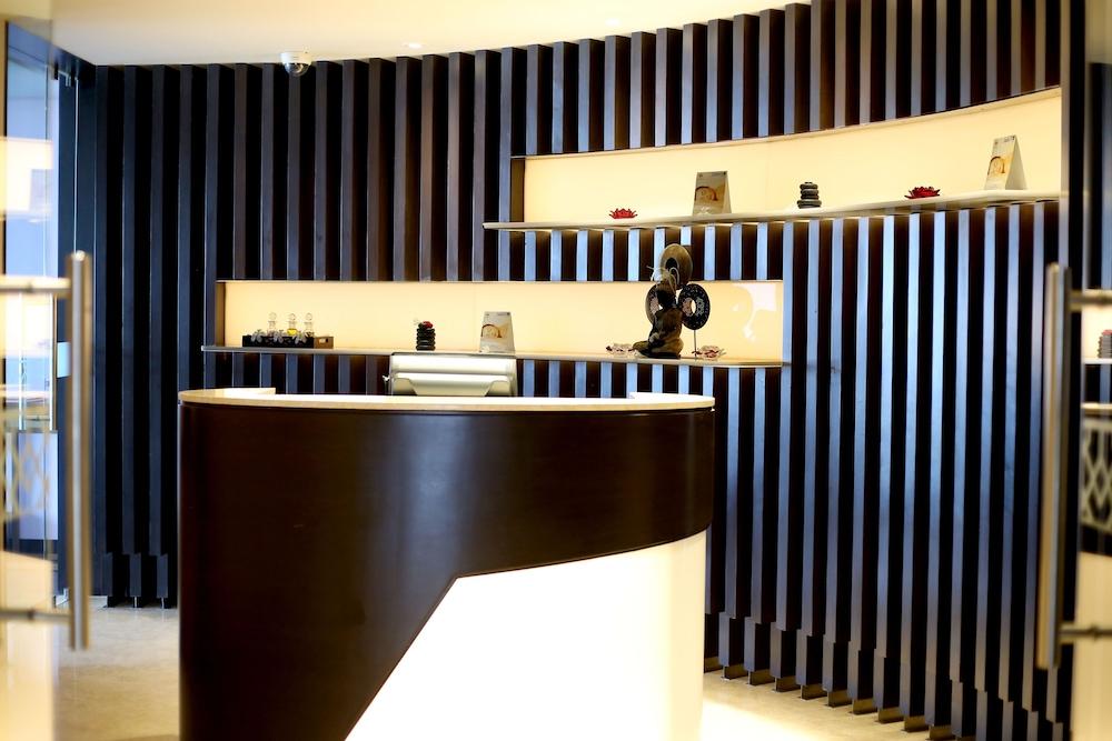 Radisson Blu Coimbatore Exterior photo The reception desk at the hotel