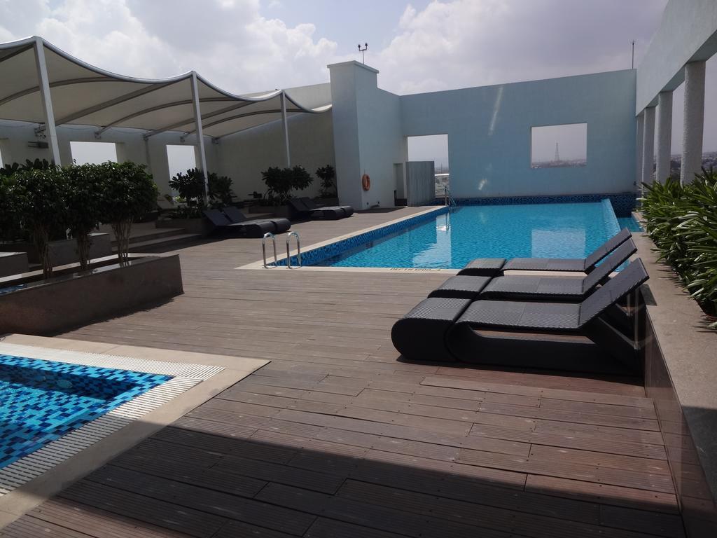 Radisson Blu Coimbatore Exterior photo Rooftop pool at the hotel