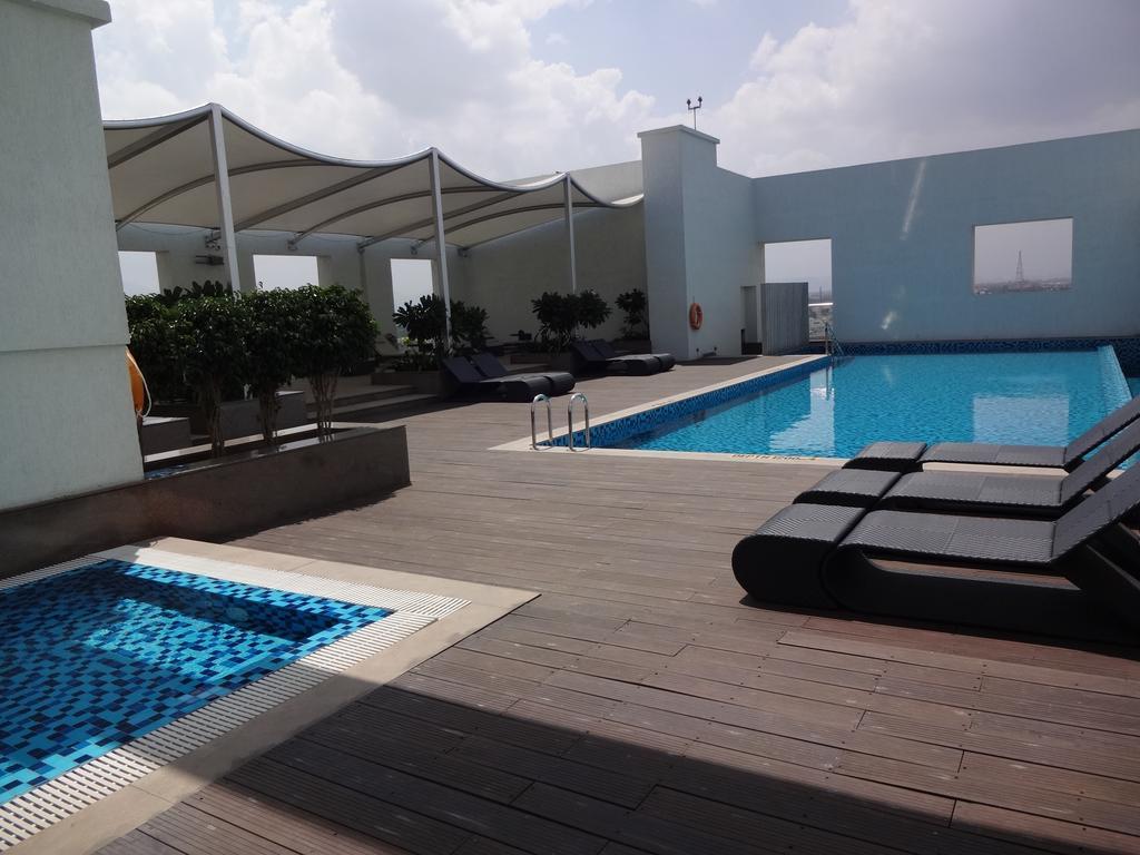 Radisson Blu Coimbatore Exterior photo Rooftop pool at the hotel