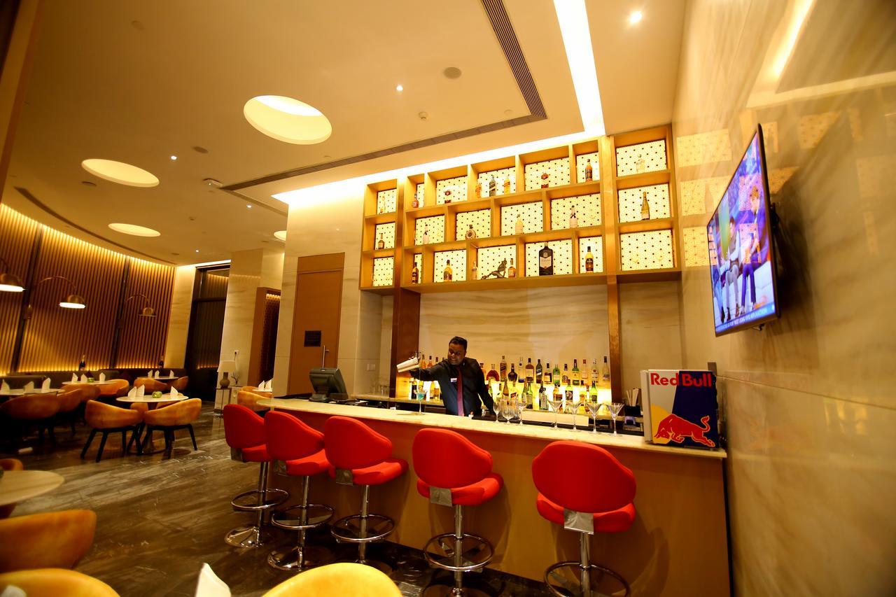 Radisson Blu Coimbatore Exterior photo The bar at the lounge