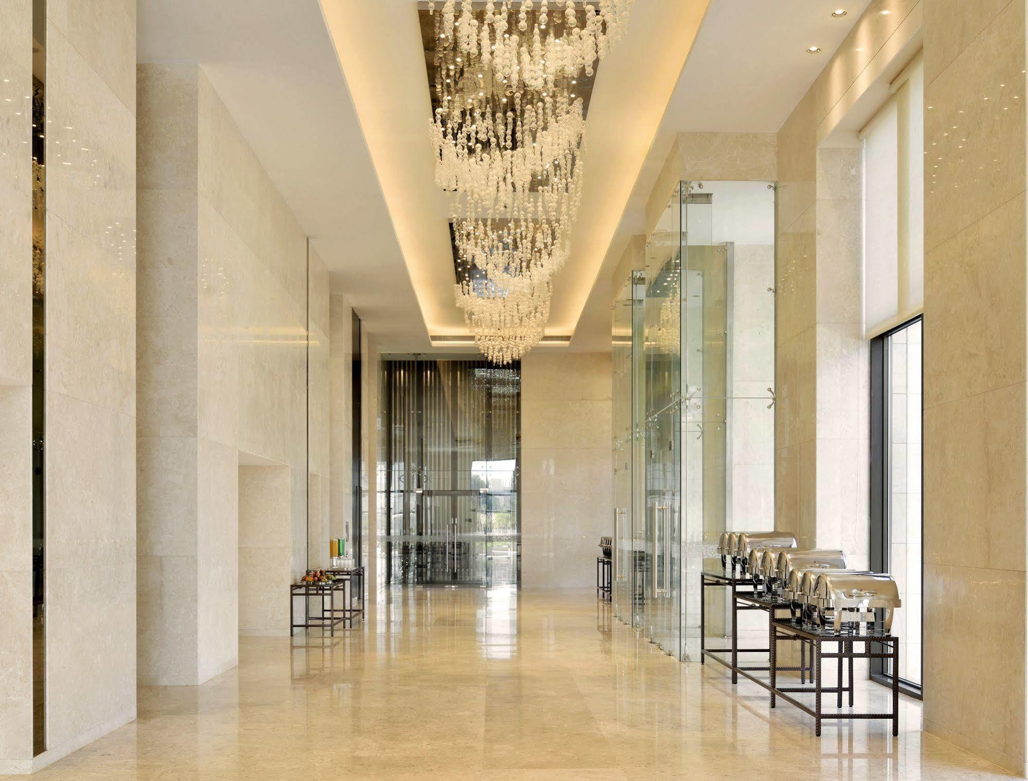 Radisson Blu Coimbatore Exterior photo The lobby of the hotel