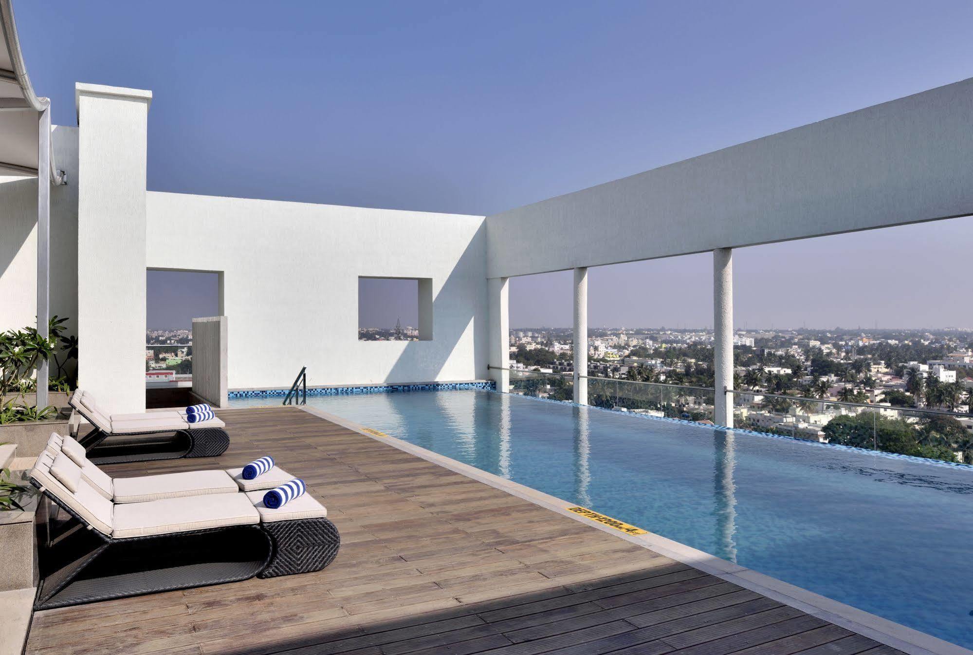 Radisson Blu Coimbatore Exterior photo Rooftop pool at the hotel